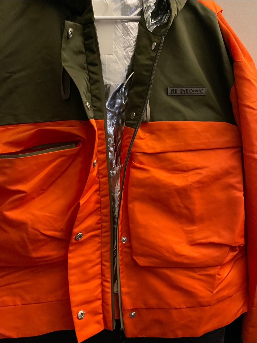 BeEyeConic EyeFly Jacket
Orange & Olive Hooded Jacket Sz XL NWT - Picture 14 of 16